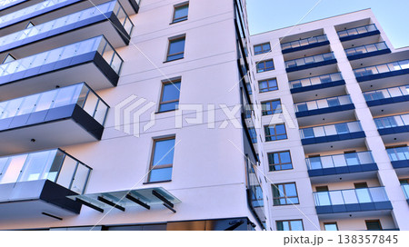 Apartments in residential complex. Housing structure at modern house. Architecture for property investment. and architecture details. Urban abstract - windows of apartment building. Apartments in residential complex. Housing structure at modern house. Architecture for property investment. and architecture details. Urban abstract - windows of apartment building. 138357845