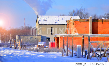 Single family house construction site. Modern designed single-family house under construction. 138357972