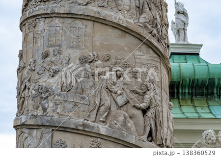 Column with spiral narrative in front of Karlskirche baroque church in Karlsplatz square in Vienna, Austria 138360529