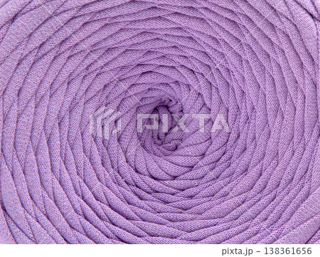 Textured cotton tape  background, rows of yarn for knitting forming geometric patterns and curves. 138361656
