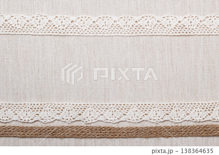 Lace frame on linen cloth background Lace frame on linen cloth background 138364635