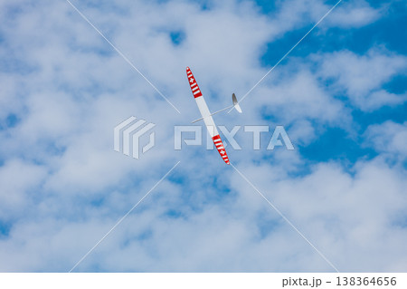 RC soaring plane on blue sky 138364656