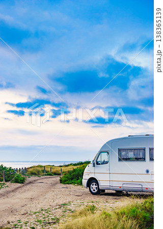Rv motor home camping on beach 138365139