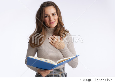 Grateful Professional Woman with Blue Notebook Grateful Professional Woman with Blue Notebook 138365197