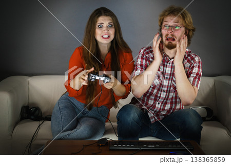 Gamer couple playing games 138365859