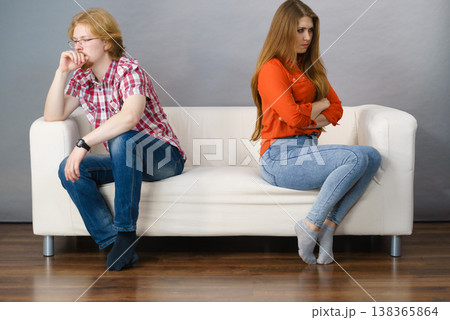 Woman and man after argue on sofa Woman and man after argue on sofa 138365864