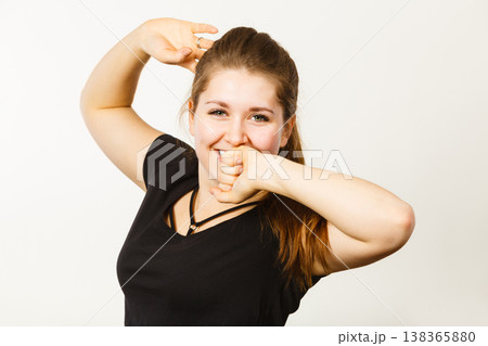 Happy woman stretching after work or sleep Happy woman stretching after work or sleep 138365880