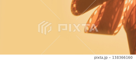blurred Film strip shadow creating an old cinematic mood, banner format blurred Film strip shadow creating an old cinematic mood, banner format 138366160