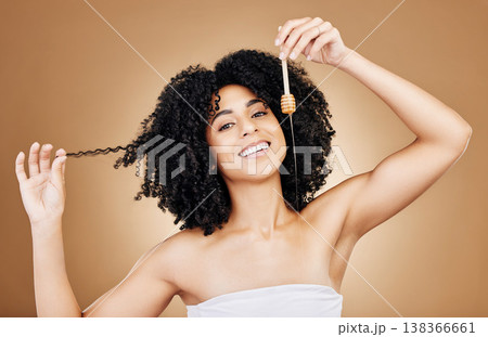 Hair, beauty and portrait of woman with honey, natural care and oil treatment on studio background with happiness. Happy, African haircare and product with honeycomb, moisture and sugar benefits 138366661