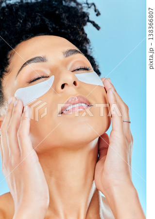 Relax, woman face and under eye patch for skincare hydration glow, beauty self care or feel moisturizing product results. Spa salon wellness, studio cosmetics and facial mask model on blue background 138366807