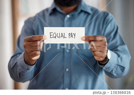 Hands, paper sign and equal pay for person in office with opinion, vote and activism with promotion. Business, board or banner for gender equality, worker and human rights for salary in workplace Hands, paper sign and equal pay for person in office with opinion, vote and activism with promotion. Business, board or banner for gender equality, worker and human rights for salary in workplace 138366816