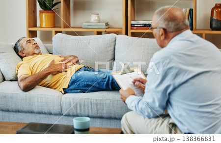 Old man, mental health and psychologist on sofa or .counseling with anxiety, stress or depression. Elderly person, therapist or support helping advice, talking or results, problem or sad in office 138366831