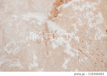 Close-up of natural stone texture with coral and ginger orange tones. Rough rocky surface pattern Close-up of natural stone texture with coral and ginger orange tones. Rough rocky surface pattern 138366981