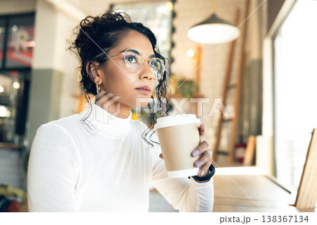 Woman in cafe, thinking and future, coffee and young student search for inspiration and insight. Latte drink, knowledge and ideas, memory or reflection on life with mindfulness on a break at diner 138367134