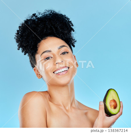 Happy woman, portrait and avocado for natural beauty, skincare or diet against a blue studio background. Face of female person smile with organic vegetable for nutrition, vitamin C or skin wellness Happy woman, portrait and avocado for natural beauty, skincare or diet against a blue studio background. Face of female person smile with organic vegetable for nutrition, vitamin C or skin wellness 138367214