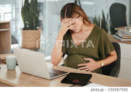 Woman, office and pregnant with stress, headache and laptop at work, burnout and workplace. Maternity, employee and pregnancy with hand on stomach, pain and tired for baby, working and healthcare 138367300
