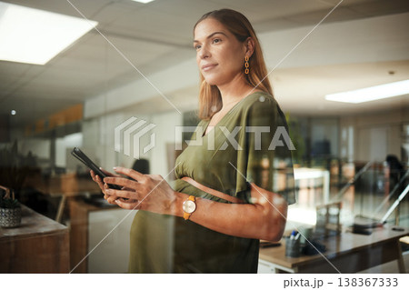 Woman, thinking and smartphone with smile in office for business, networking or ideas for marketing or pregnant. Person, phone and happiness at work for communication, conversation or internet chat 138367333