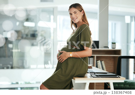 Portrait, belly and a pregnant woman in her business office at the start of her maternity leave from work. Company, smile and pregnancy with a happy young employee in the workplace for motherhood 138367408