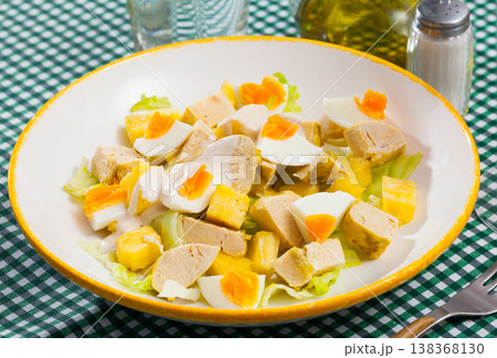 Salad with chicken, egg and pineapple Salad with chicken, egg and pineapple 138368130
