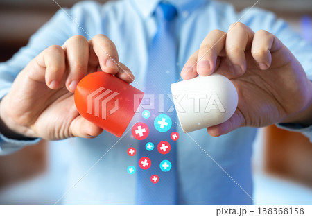 A man breaks open a medical capsule to analyze contents. Drug quality and safety become critical concerns. Evidence-based medicine ensures trust and transparency in pharmaceuticals. 138368158