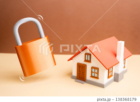 Private home with a padlock symbolizes property security and protection. Safety measures ensure ownership rights. Risk prevention, surveillance, and home protection systems support Private home with a padlock symbolizes property security and protection. Safety measures ensure ownership rights. Risk prevention, surveillance, and home protection systems support 138368179