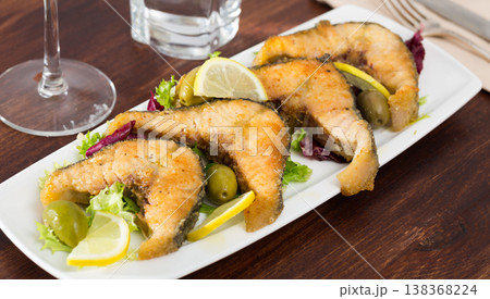 Fried sturgeon fish with lemon Fried sturgeon fish with lemon 138368224