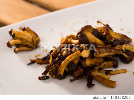 Appetizing fried wood mushrooms Appetizing fried wood mushrooms 138368260