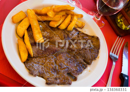 Lamb fillet with french fries Lamb fillet with french fries 138368331