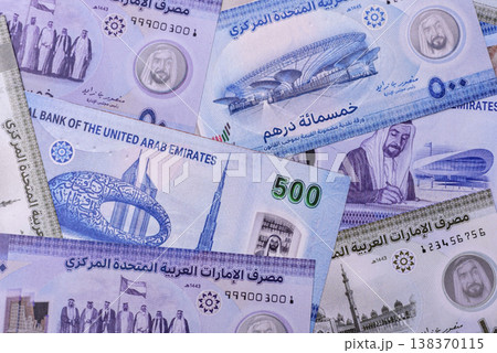 United Arab Emirates cash, dirhams and coins for exchange and financial transactions. UAE currency United Arab Emirates cash, dirhams and coins for exchange and financial transactions. UAE currency 138370115