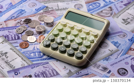 United Arab Emirates cash, dirhams and coins for exchange and financial transactions. UAE currency 138370134