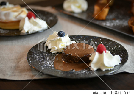 Melting chocolate cake pudding on a plate 138371555