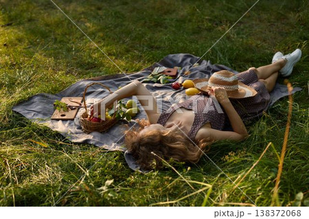 Quiet rural landscape showing woman enjoying her leisure time 138372068