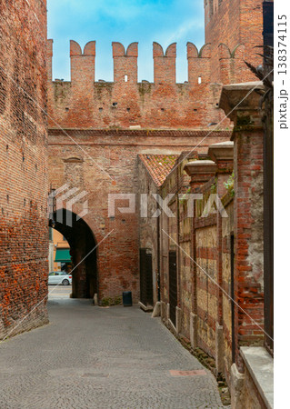 Scaliger Bridge walkway with red brick walls in Verona, Italy 138374115