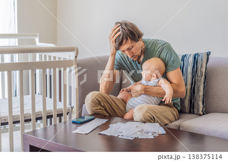 Father sitting on sofa holding baby while calculating monthly expenses with receipts at home. Stressed dad managing budget and childcare. Financial stress, parenthood and real life concept Father sitting on sofa holding baby while calculating monthly expenses with receipts at home. Stressed dad managing budget and childcare. Financial stress, parenthood and real life concept 138375114