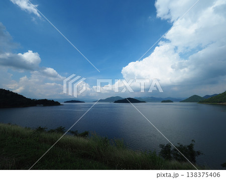 Lake mountain cloud blue sky calm water island peaceful landscape blue sky calm water with distant island mountain and soft Lake mountain cloud blue sky calm water island peaceful landscape blue sky calm water with distant island mountain and soft 138375406
