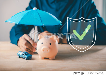 Umbrella on car, piggy bank shows money insurance save finance safety, providing reliable secure protection for personal wealth using shield icon for long term stability Umbrella on car, piggy bank shows money insurance save finance safety, providing reliable secure protection for personal wealth using shield icon for long term stability 138375784