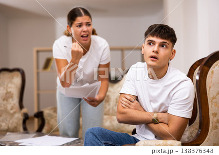 Man is sad because of conflict with his wife at home Man is sad because of conflict with his wife at home 138376348