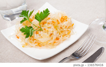 Homemade sauerkraut on white plate 138376416