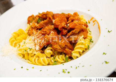 Italian fusilli pasta with pork and cheese Italian fusilli pasta with pork and cheese 138376674