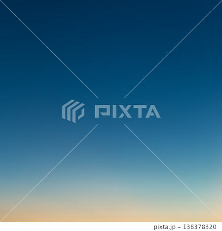 Photo of a beautiful clear evening sky without clouds. Sky gradient from orange to blue. 138378320