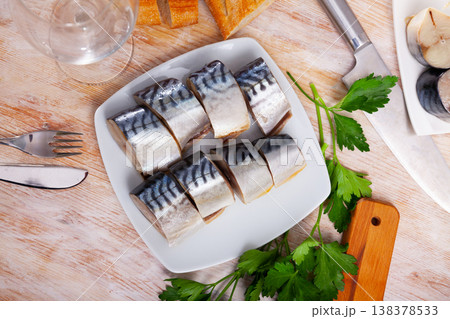 Salted scomber with baguette on plate Salted scomber with baguette on plate 138378533