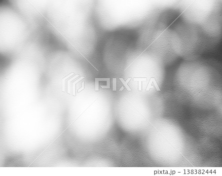 Bokeh of Tree Shadow and Bokeh on White Concrete Wall Background 138382444