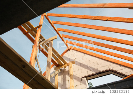 Modern attic shell, wooden lag and stropil system nearly complete, future home financed by bank mortgage, insurance policy covers risks. Modern attic shell, wooden lag and stropil system nearly complete, future home financed by bank mortgage, insurance policy covers risks. 138383155