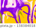 Graffiti on Urban Concrete Wall with Purple and Yellow Spray Paint 138384018