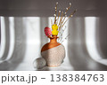 Easter spring decoration with a chick and eggs in a vase with pussy willow branches 138384763