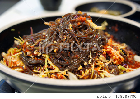 Korean Spicy Buckwheat Noodles (Mak-guksu) with Fresh Vegetables in a Bowl Korean Spicy Buckwheat Noodles (Mak-guksu) with Fresh Vegetables in a Bowl 138385780
