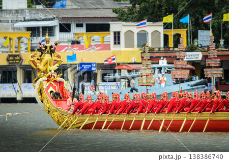 BANGKOK,THAILAND-NOVEMBER 9:Decorated barge parades past the Grand Palace at the Chao Phraya River during Fry the Kathina ceremony cloth of Royal Barge Procession on Nov. 9, 2012 in Bangkok,Thailand BANGKOK,THAILAND-NOVEMBER 9:Decorated barge parades past the Grand Palace at the Chao Phraya River during Fry the Kathina ceremony cloth of Royal Barge Procession on Nov. 9, 2012 in Bangkok,Thailand 138386740