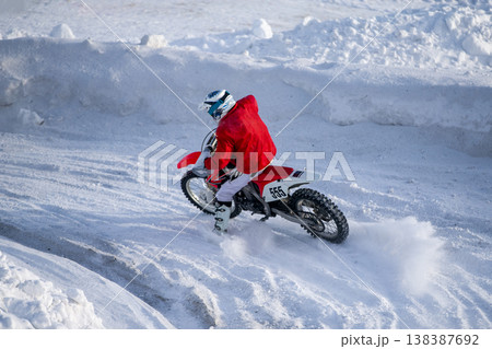 Motocross rider on dirt bike Motocross rider on dirt bike 138387692