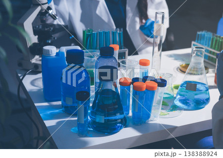 Science, laboratory and woman with pipette, test tube and biotech solution in research. Medical innovation, scientist or lab technician in study for healthcare, medicine and vaccine results feedback. Science, laboratory and woman with pipette, test tube and biotech solution in research. Medical innovation, scientist or lab technician in study for healthcare, medicine and vaccine results feedback. 138388924