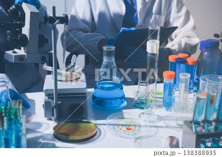 Science, laboratory and woman with pipette, test tube and biotech solution in research. Medical innovation, scientist or lab technician in study for healthcare, medicine and vaccine results feedback. Science, laboratory and woman with pipette, test tube and biotech solution in research. Medical innovation, scientist or lab technician in study for healthcare, medicine and vaccine results feedback. 138388935